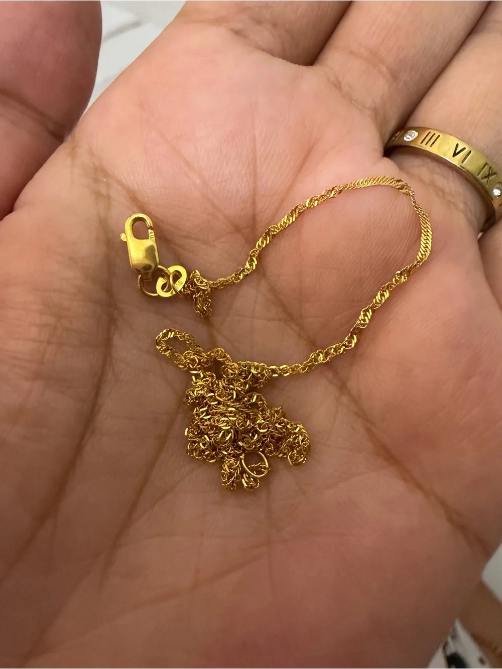 22k solid gold chain tangled need an easy fix